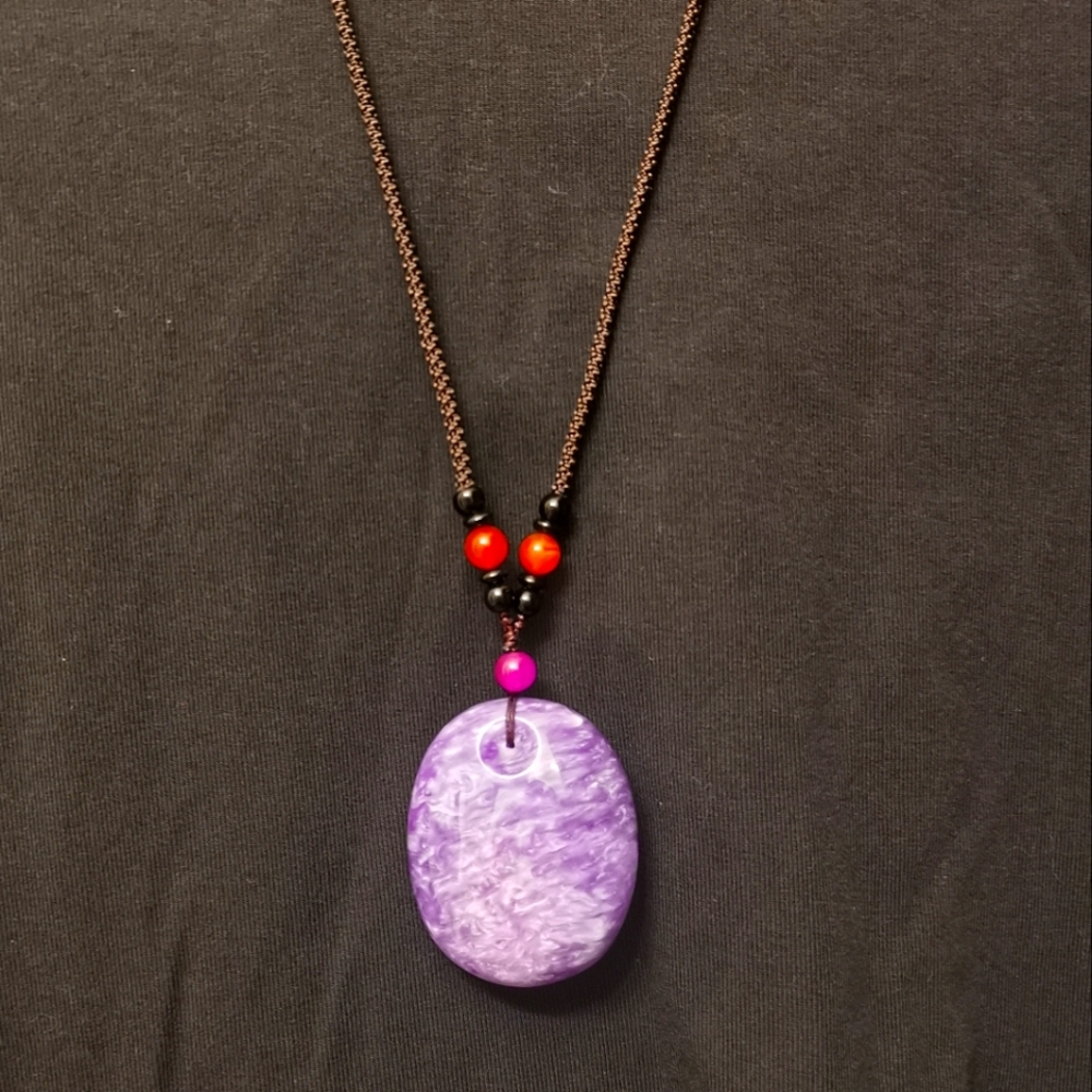Purple like amber pendant necklace.